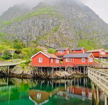 Historic Å fishing village with red cabins and docks near Maritime Munchies in Lofoten Islands