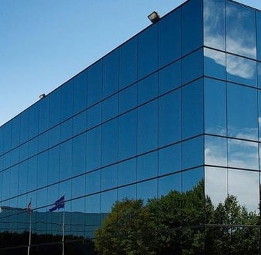 a building with a lot of windows and a sky view