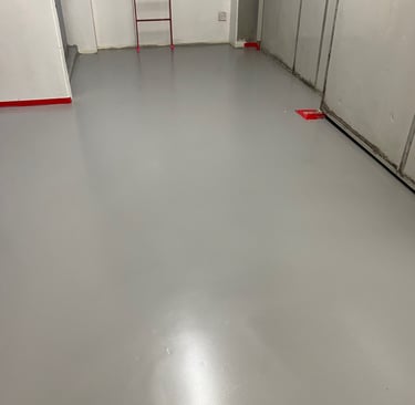 Tswanacrete Botswana applying industrial epoxy and polyurethane floor coatings for durable, chemical-resistant surfaces
