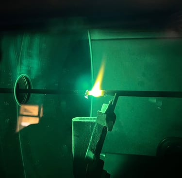 Figure 2 - View through the inspection glass at the carbon flame.