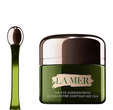 La Mer The Eye Concentrate cream jar with silver lid and matching applicator wand for anti-aging skincare.
