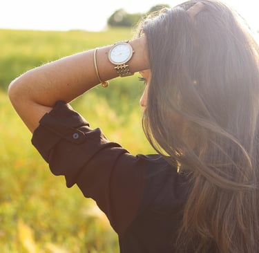 Luxury watch styled with an elegant everyday outfit