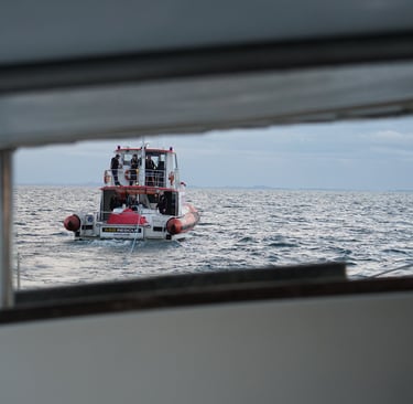 Coast Guard giving us a tow into port