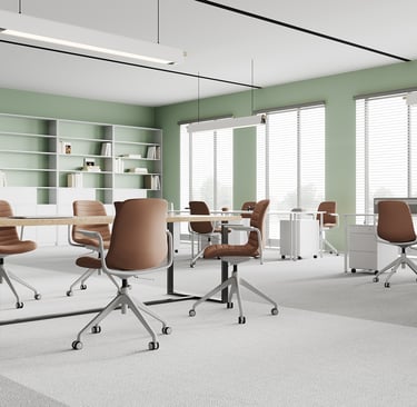 Office lounge with SenSit-Otto swivel chairs and bookshelf wall