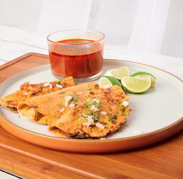 a plate with a plate of food and a drink