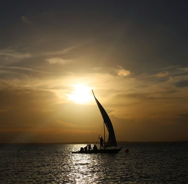 Sailing on a dhow at sunset, Zanzibar, Mjini Magharibi Region, Tanzania, by Andreea Vieru, on pexels