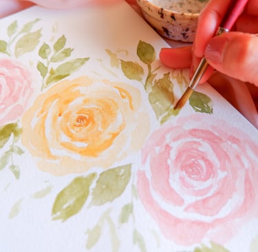Live watercolor floral painting of roses for NYC event by Handwritten by Belle.