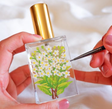 Perfume bottle personalized with floral painting by NYC live event artist Handwritten by Belle.