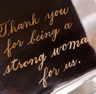 Hand engraved message on a glass by NYC engraver Handwritten by Belle.