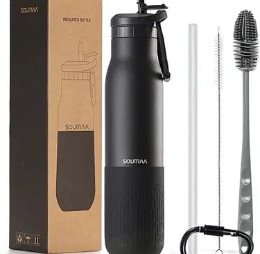 a bottle of water and a brush in a box