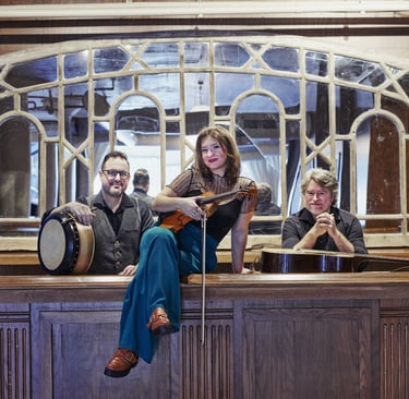 Fiddle In The Middle band members Steve Morrow, Evelyn Thom and Jesse Langen .
