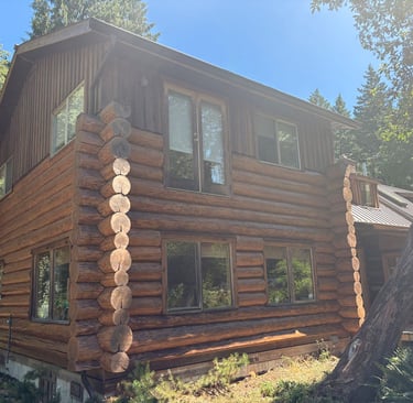 Log home in Courtenay after restoration by Embassy Restorations Vancouver Island