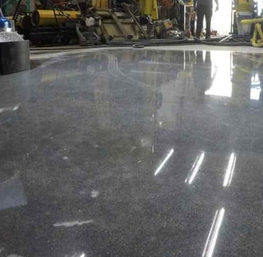 Traitement béton, ponçage et résines décoratives - solutions DG Services pour sols industriels & des