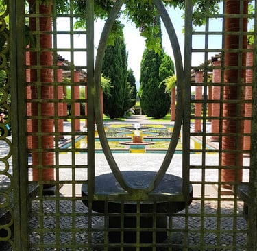 a circular shaped metal gate with a circular mirror