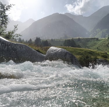 a river with a mountain in the background
