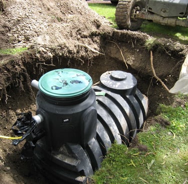a man is standing in the middle of a hole in the ground
