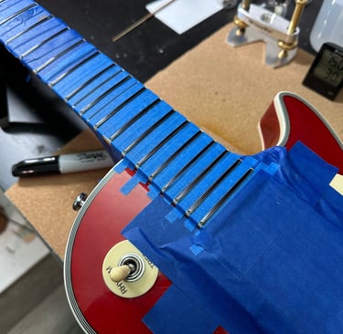 Fret Dressing and repair replacement- Penguin Guitar Co.