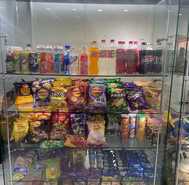 In this picture, there are Japanese energy drinks, Japanese Pepsi with peach in it peach soft drinks