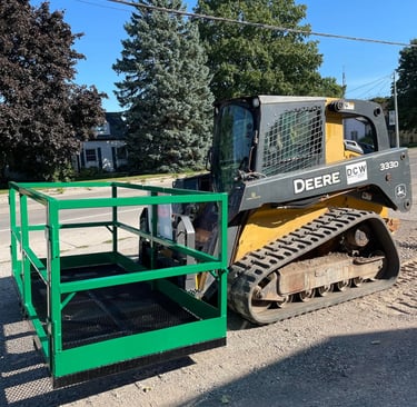 Custom man basket work platform lowered by skid steer