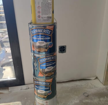 a stack of cans of various types of cans