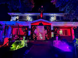 Elaborate Halloween display at night.