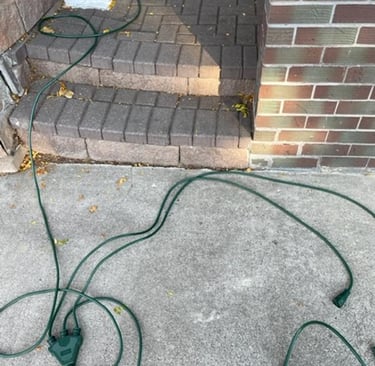 extension cords outside causing trip hazards