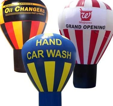 three inflatable decorations for businesses