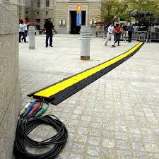 Outdoor cord cover for walkways