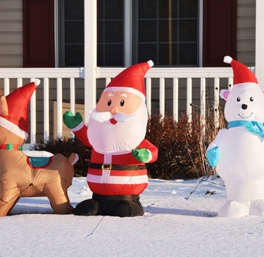 inflatable Santa, reindeer, and bear displays