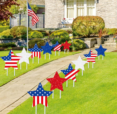 patriotic yard signs along walkway
