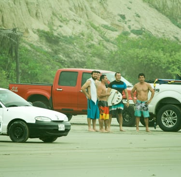 Group of friends talking after the surf session