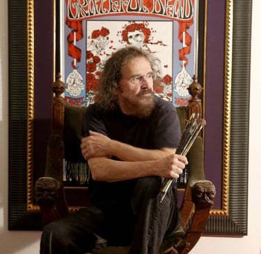 Stanley Mouse with his artwork