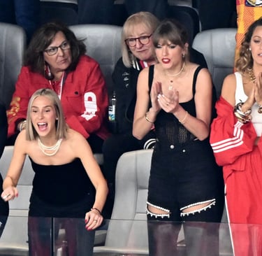 Taylor Swift watching the Super Bowl from her Celebrity Booth.