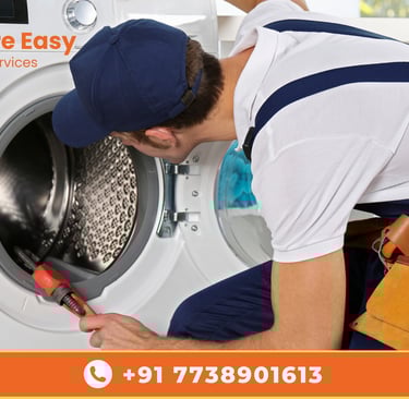 Technician repairing front-load washing machine at home with tools