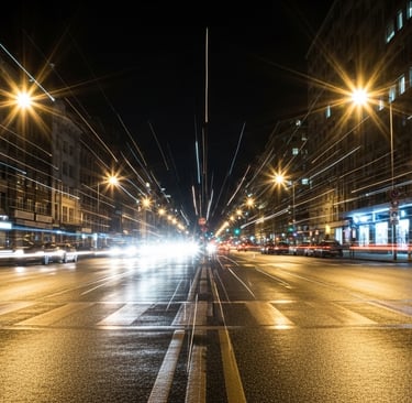 Luzes alongadas, como raios ou estrelas esticadas, com halos.