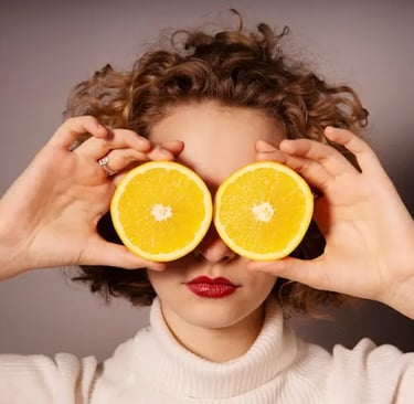 Hypnonaute: Hypnosis session prices in Geneva (ASCA certified) – A woman holding oranges