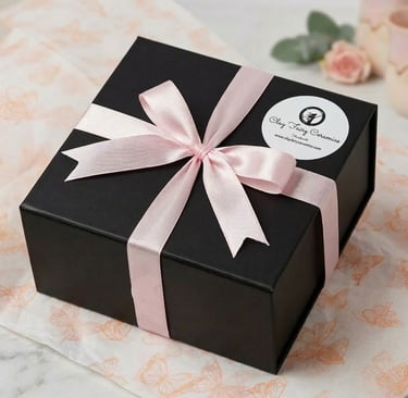 Gift-wrapped Irish pottery in a luxury black box with pink ribbon for international tracked shipping