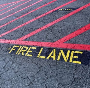 Fire lane red traffic paint