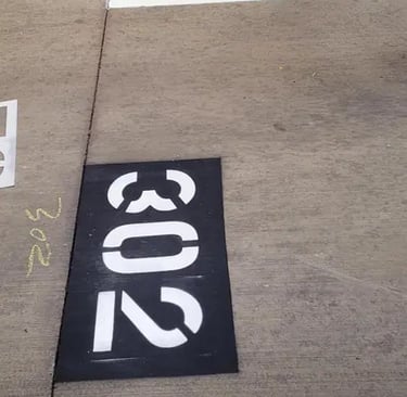 Parking stencil number