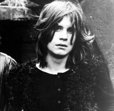 Trade ad for Black Sabbath's album Black Sabbath (1970). From left to right: Geezer Butler, Tony Iom