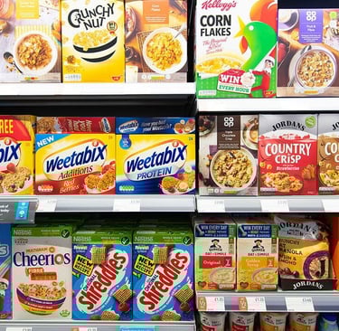 a variety of cereals and cereals on display in a store