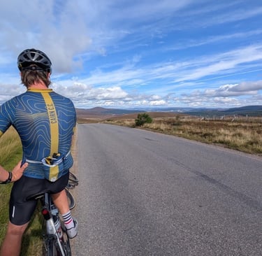 Cairn CC rider on the summit of Cairn O Mount