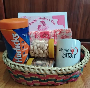 Mother's Day gift basket with Horlicks, nuts, and a personalized ceramic mug in a woven hamper.