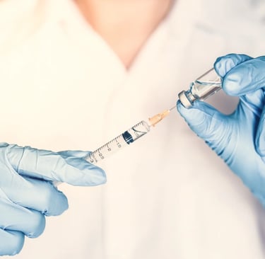 a doctor filling a syringe