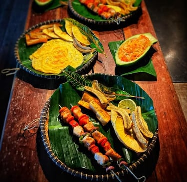 a table with a variety of food items on itNosy Be