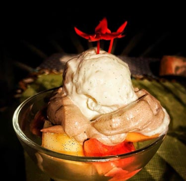 a bowl of fruit and ice cream in a bowl Nosy Be