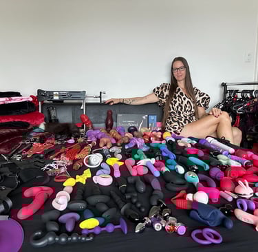 Pleasurelit Patricia with her pleasure toys and tools collection