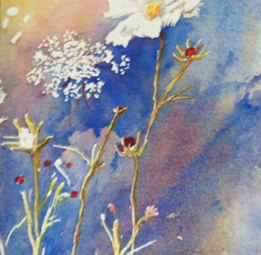 a watercolor of delicate flowers against blue sky 