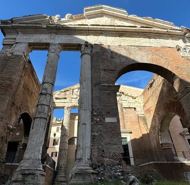 Ancient columns in ruins at the Temple of Saturn in Rome, Italy