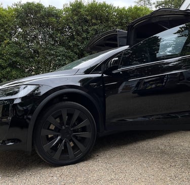 SUV with Ceramic Film installed for maximum heat rejection and UV protection by Bluemax Tint in Live